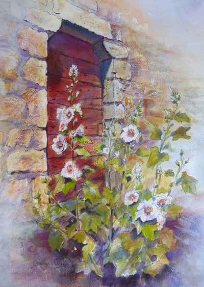 Painting of hollyhocks set against rustic wood and stone wall. Painting by Carolyn Wilson