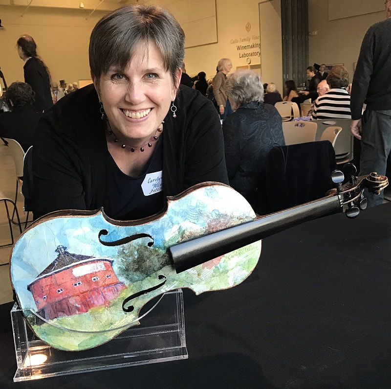 Artist Carolyn Wilson and her painted violin. Sold ar auction for Santa Rosa Symphony Youth Orchestra