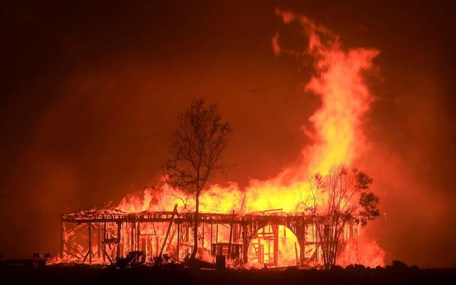 Photo of Fountaingrove Round Barn on fire.